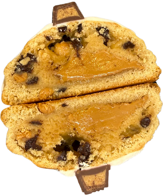 PEANUT BUTTER stuffed New York style cookie with peanut butter , roasted peanuts